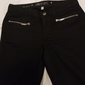 Jennifer Lopez black pants.